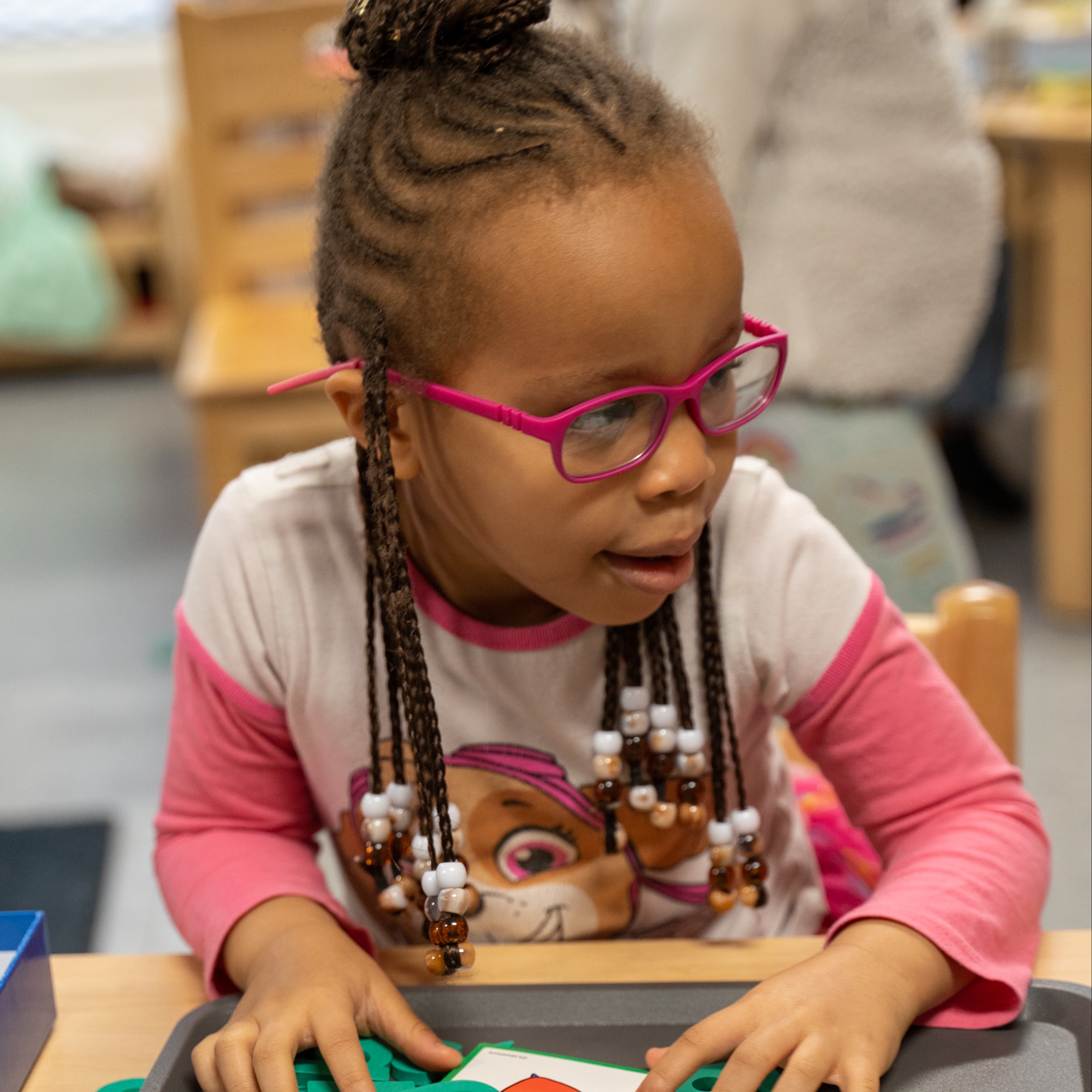 young girl learning